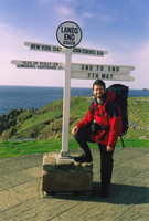 Mark posing by the Land's End signpost before setting off for John o'Groats
