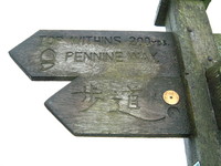 A signpost in English and Japanese