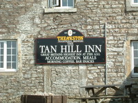 A sign proclaiming the Tan Hill Inn to be 'Great Britain's Highest Inn'