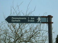 A sign in Cold Ashton pointing towards 'Pennsylvania'