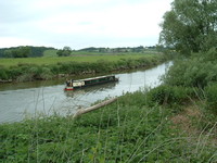 A canal boat on the River Severn